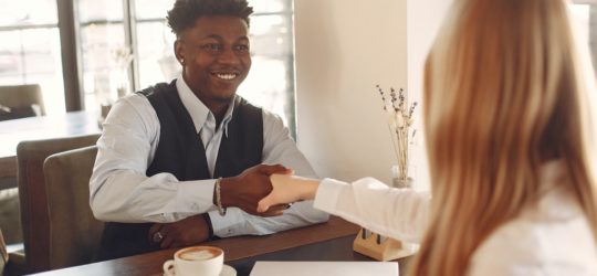 An HR manager interviewing a candidate with behavioral interview questions