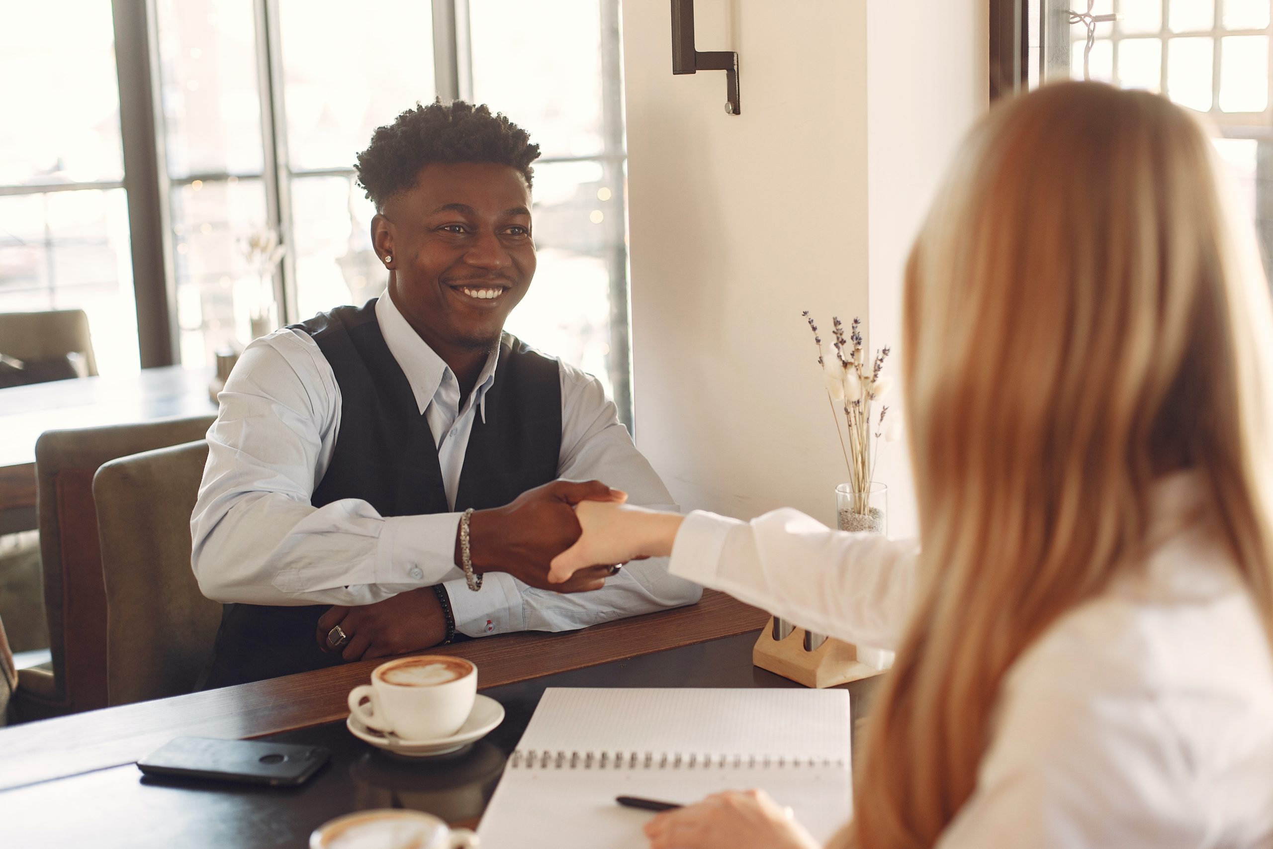 An HR manager interviewing a candidate with behavioral interview questions