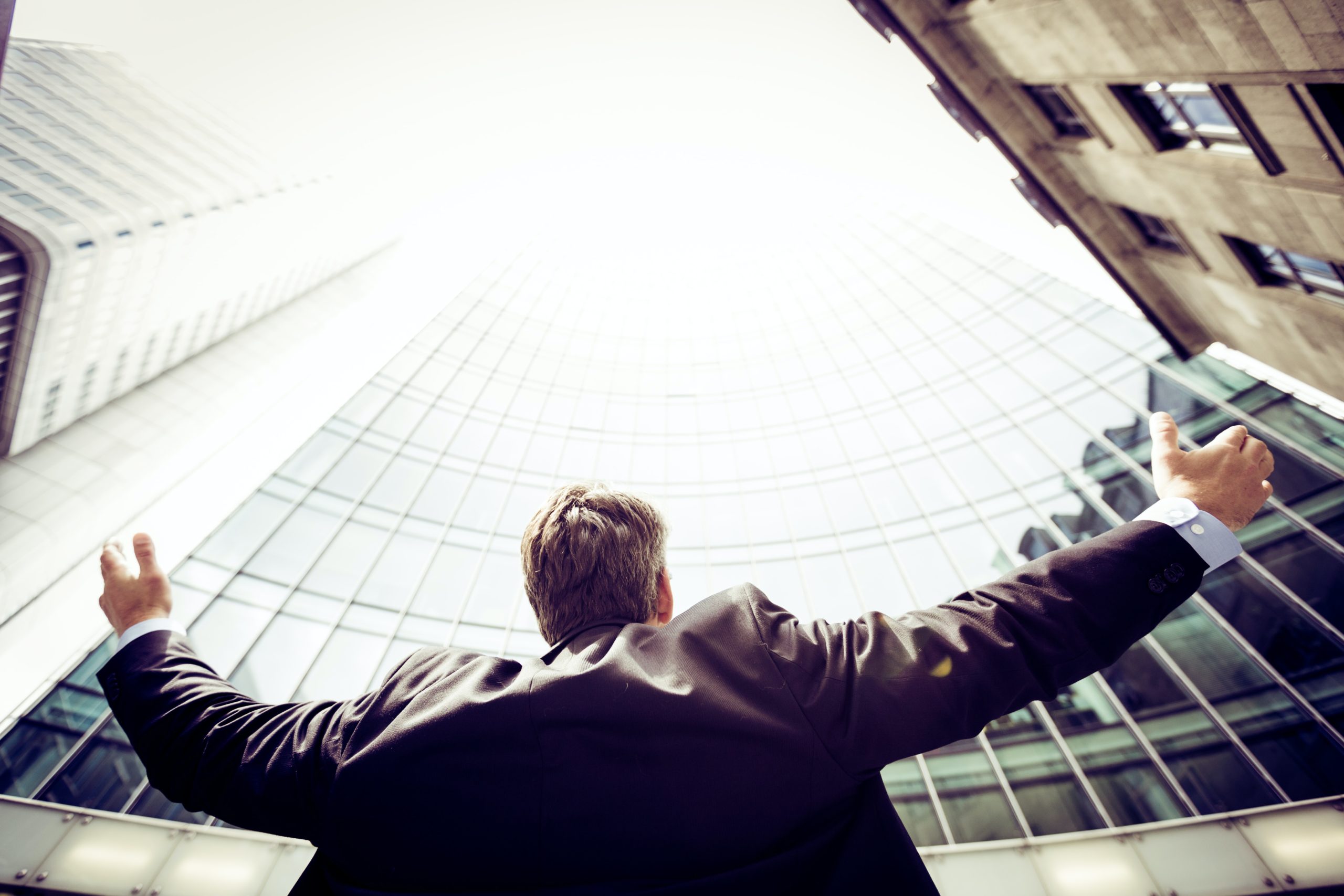 small business owner looking up at the sky