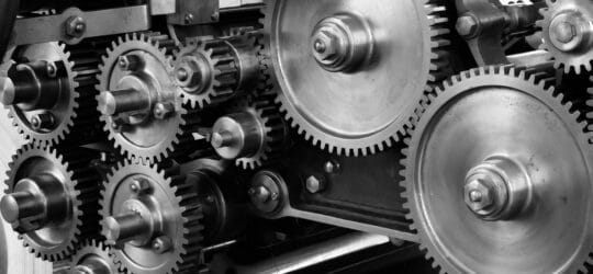 Gray Scale Photo of Gears